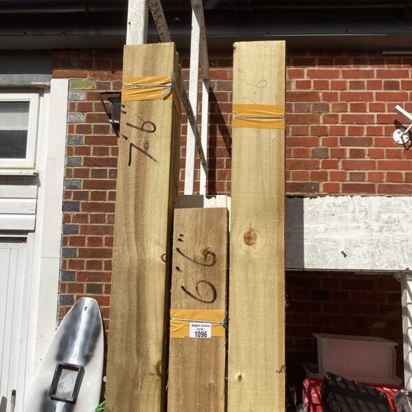 Strapped bundles of timber ready for construction or DIY projects.