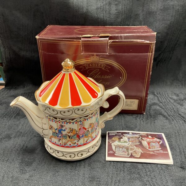 Vintage Sadler Staffordshire carousel teapot with colourful design.