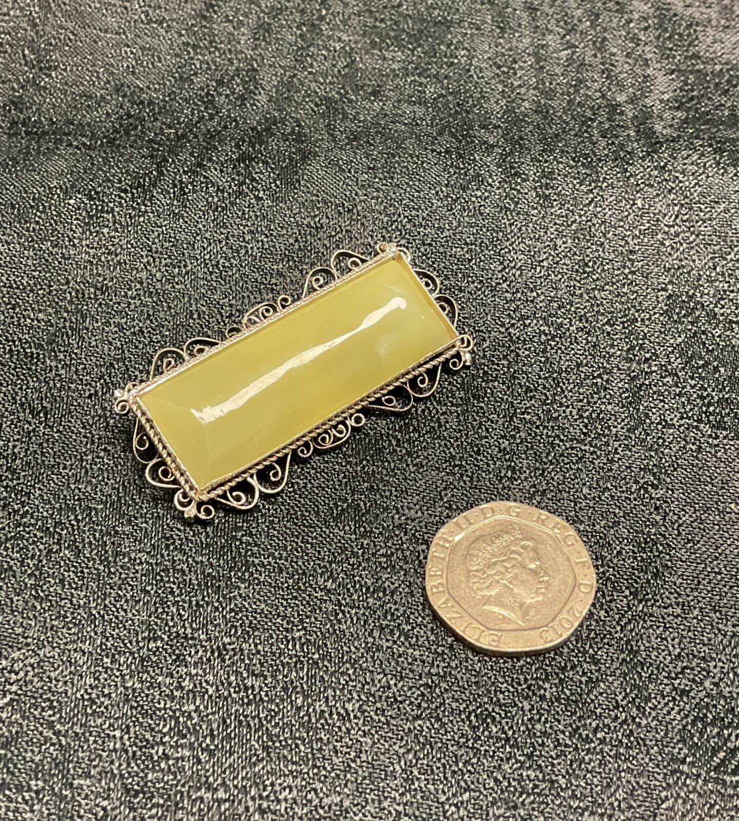 Vintage jade cushion cut brooch with filigree setting 5 cm long