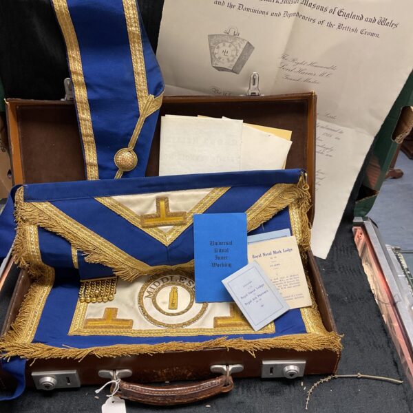 Antique Masonic leather case with collar and apron inside.