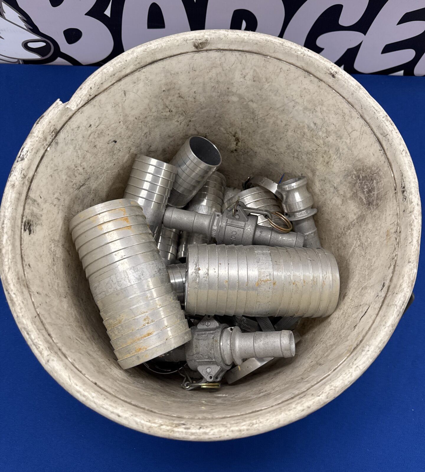 Bucket of alloy pipe/hose unions