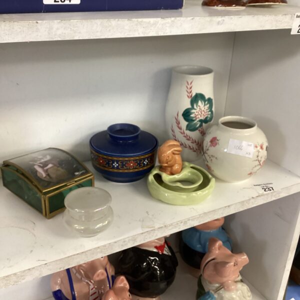 Vintage Arthur Wood pottery collection featuring a ceramic vase.