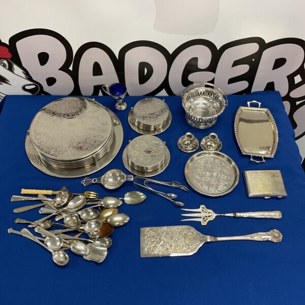 Box of silver plate coasters, cutlery & candlesticks