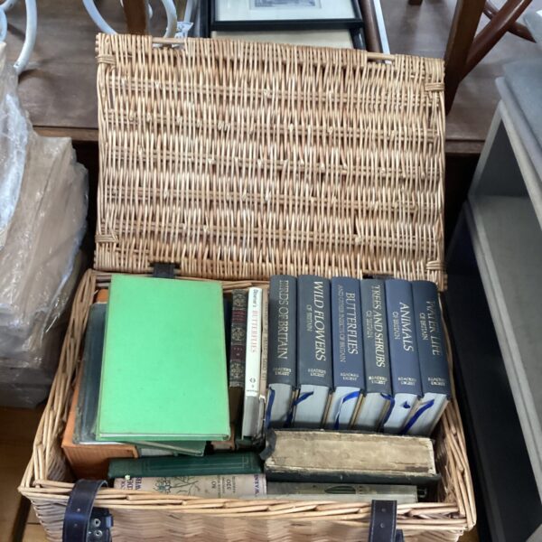 Wicker basket containing Reader Digest books
