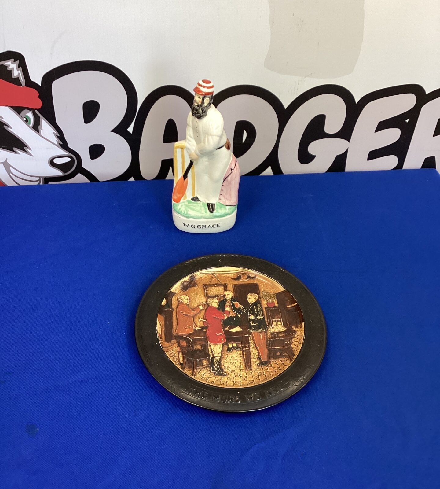 Bretby wall hanging plate and WG Grace Figurine