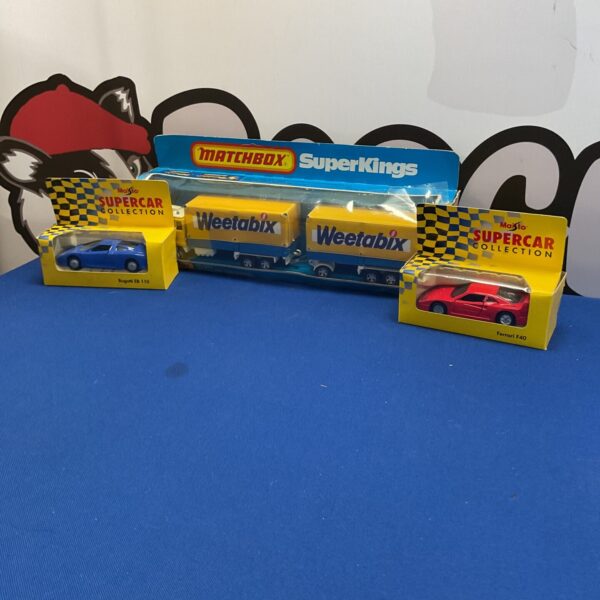 Vintage Matchbox diecast lot of three boxed model cars.
