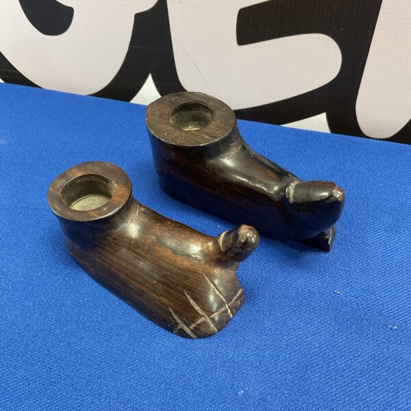 Vintage African carved foot chamber sticks, unique antique decor.