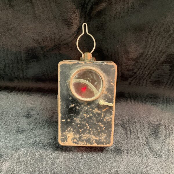 Vintage WWII German pocket lamp with red filter lens.