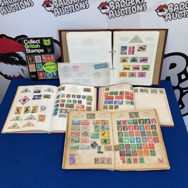 Vintage stamp collection albums filled with British stamps for collectors.