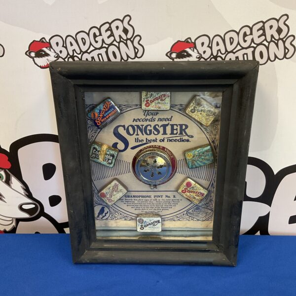 Vintage Songster needle diorama advertising display with colourful packaging.
