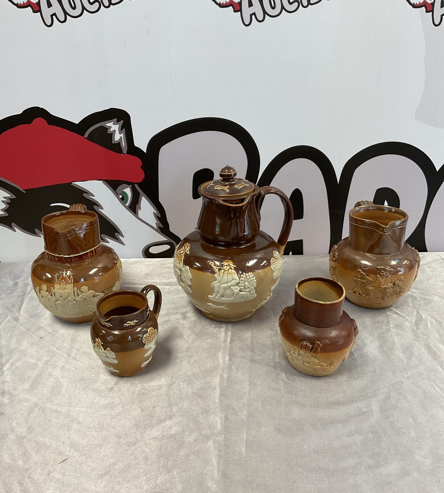 Five victorian royal doulton Lambeth ware jugs