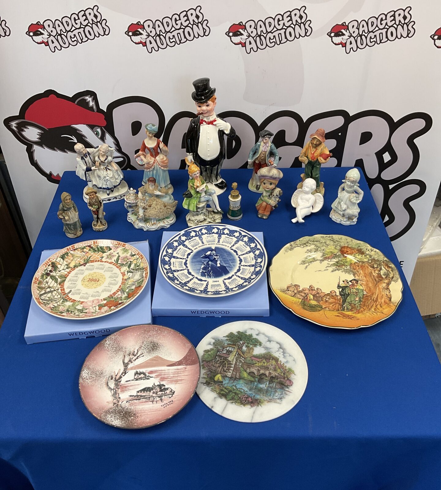 Collection of porcelain figurines & plates including royal doulton under the greenwood tree plate