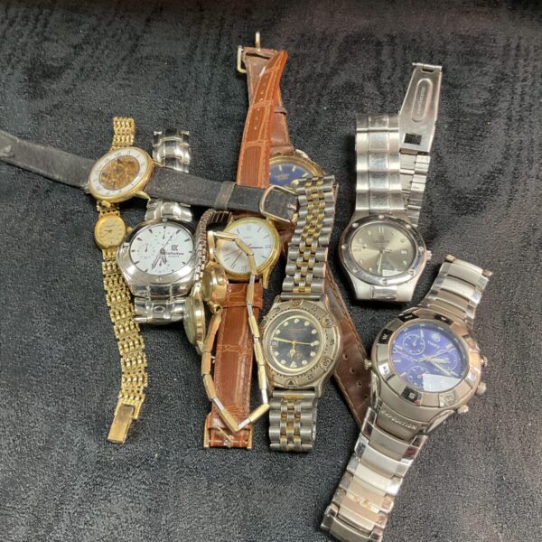 Assorted vintage watches presented as a lot for collectors.