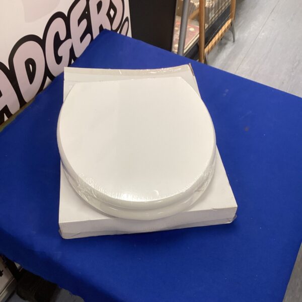 White Park Royal wooden toilet seat presented as found.