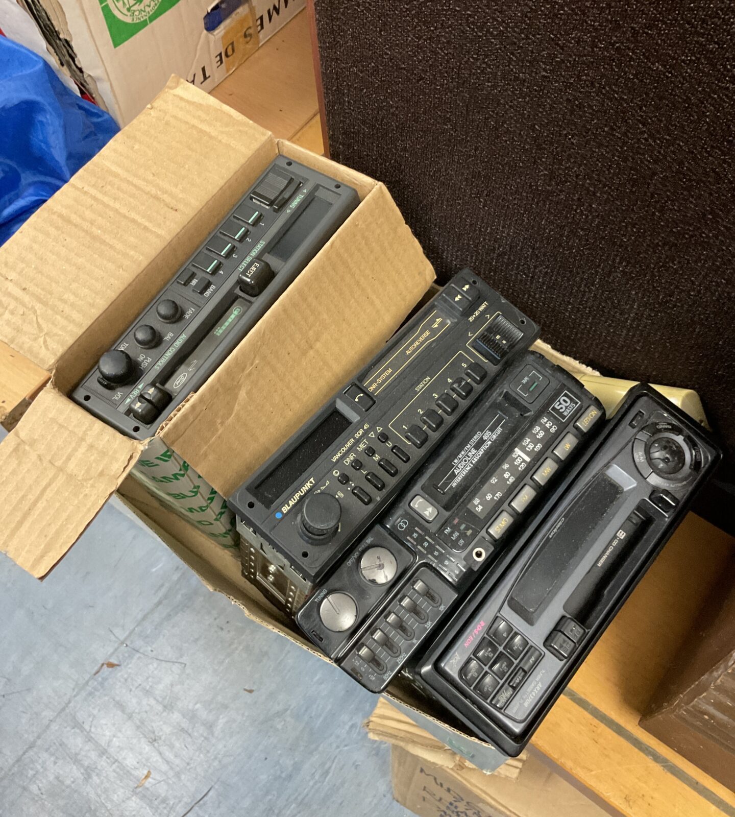 Box of retro car stereos including ford & blaupunkt