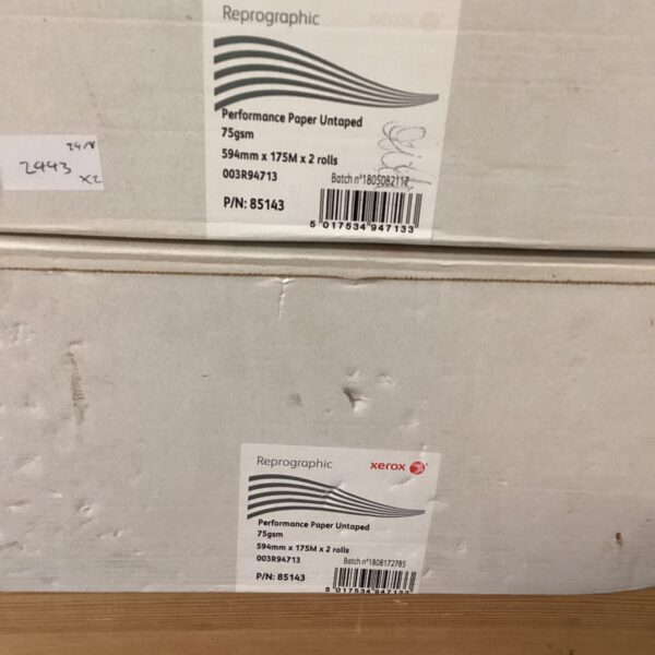 Four rolls of untaped performance paper for wide format printing.