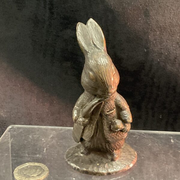 Bronzed Peter Rabbit figurine, collectible Beatrix Potter sculpture.