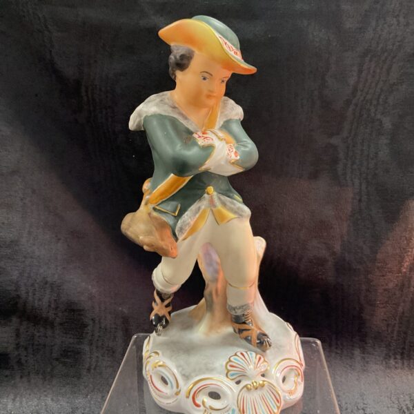 Royal Crown Derby Winter figure, antique porcelain collectible.