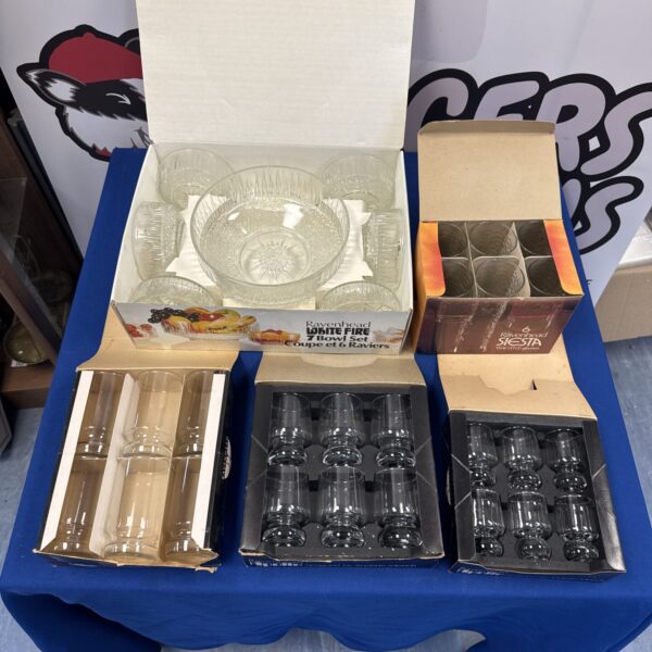 Vintage Ravenhead glassware in original boxes, a collectible barware set.