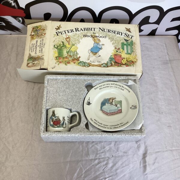 Vintage Wedgwood Peter Rabbit nursery set with charming illustrations.