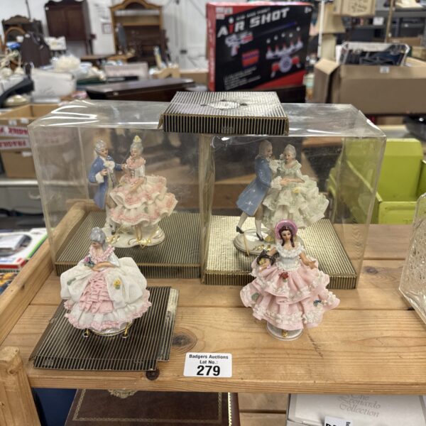 Vintage lot of four N Dresden porcelain figurines for collectors.