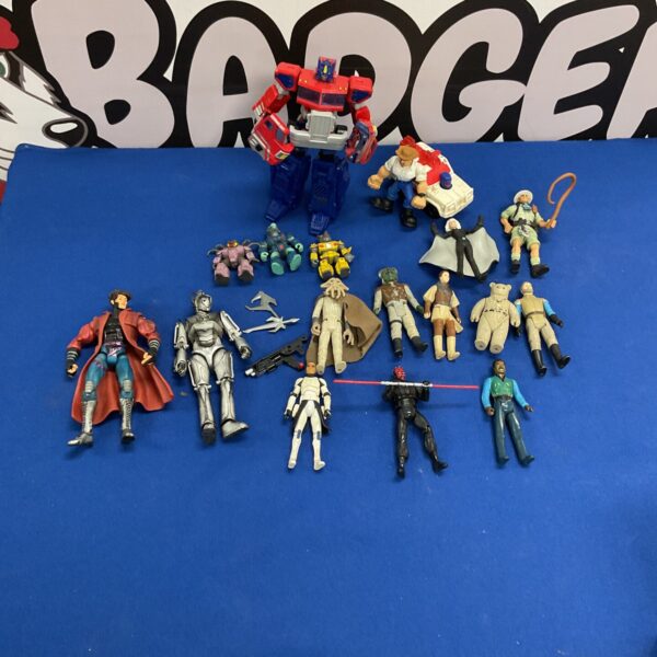 Vintage action figure lot including Transformers and LFL figures.