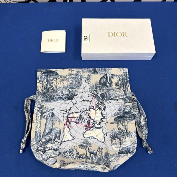 Vintage Dior toiletry bag with floral print canvas.