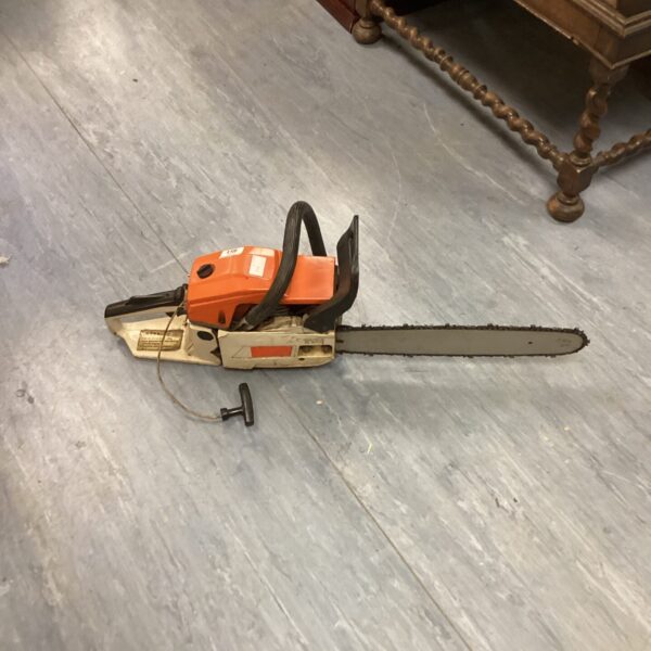 Vintage Husqvarna petrol chainsaw for garden and DIY projects.