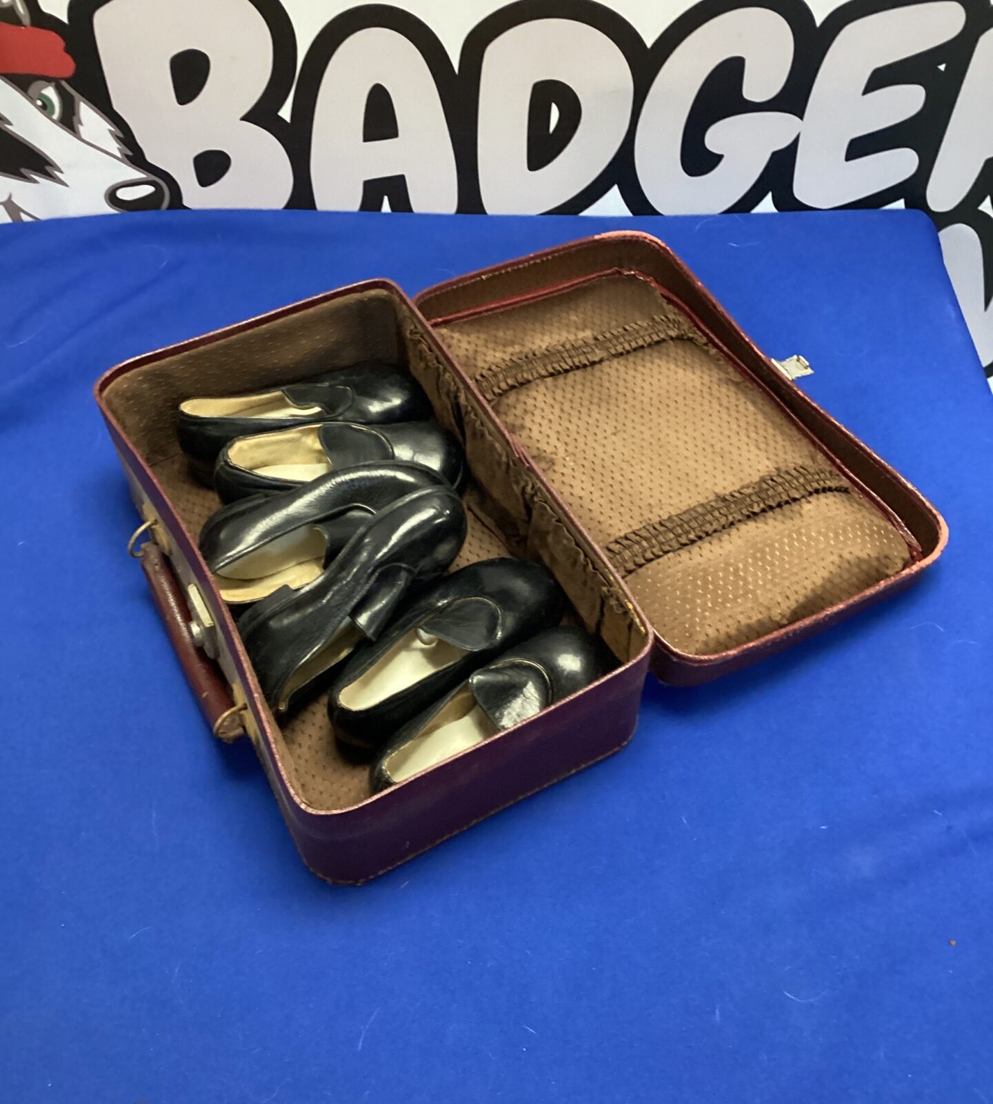 Vintage leather carry case with three pairs of kids tap dancing shoes