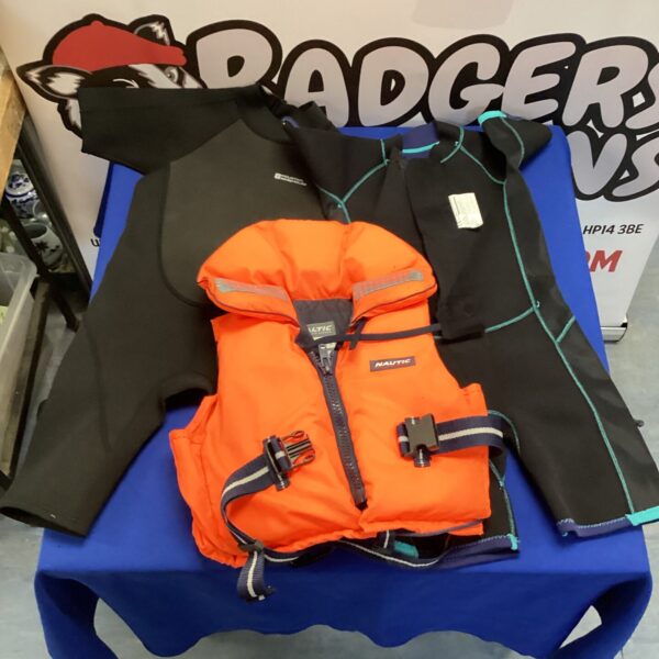 Bright orange child's life vest for watersports safety.