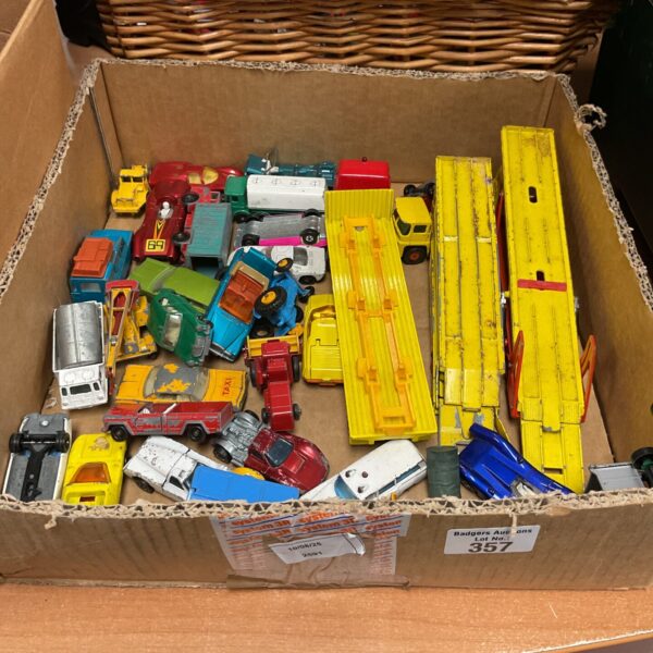 Vintage diecast model collection including Matchbox and Corgi vehicles.