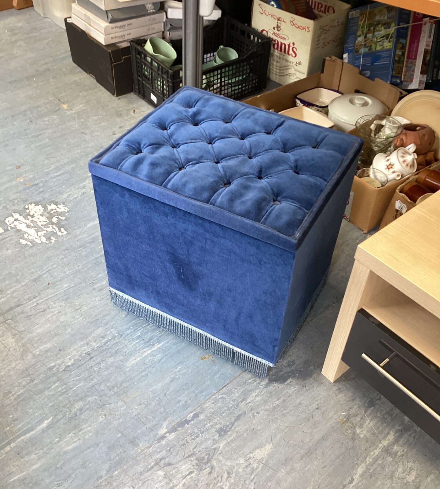 Blue velour ottoman with wooden storage tray insert - slight damage to tassles at base
