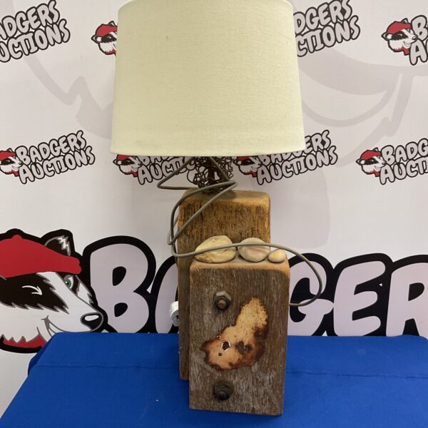 Rustic Mockbeggar Wharf table lamp with wooden base and cream shade.