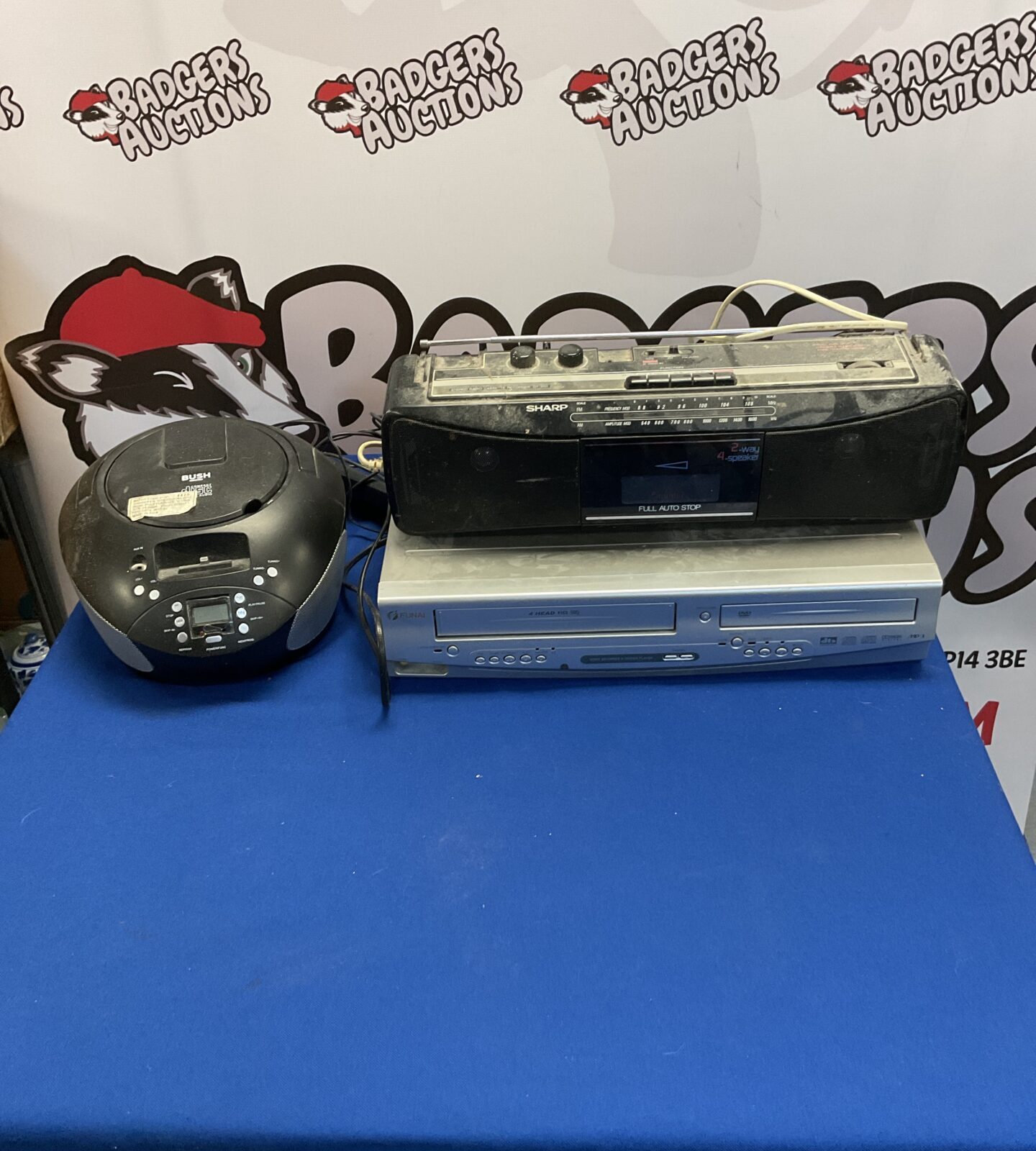 Bush cd player, Sharp stereo radio cassette recorder qt-250, and Funai video recorder and dvd/cd player