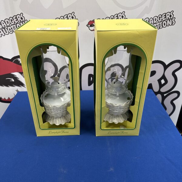 Pair of vintage Lamplight Farms paraffin lanterns for home decor.