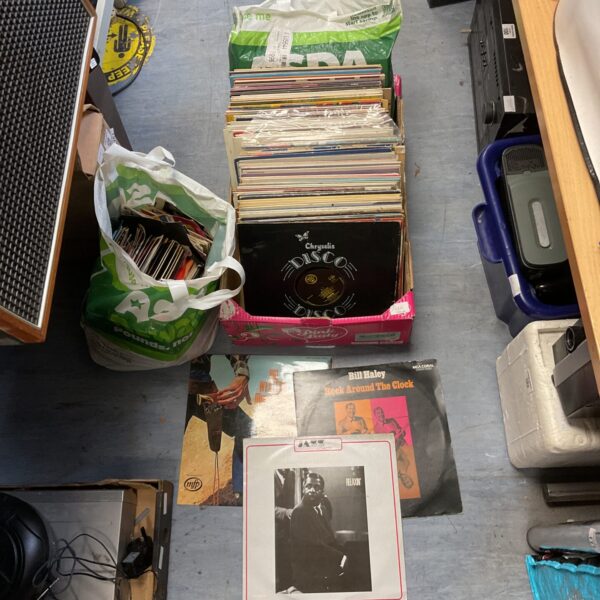 Large lot of assorted vintage vinyl records for collectors.