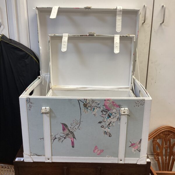 Vintage bird pattern chest, decorative storage solution.