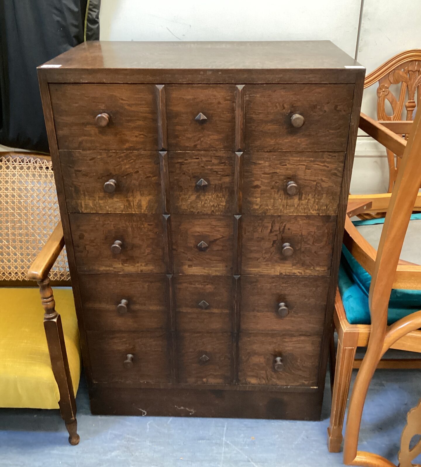 Dark wood mid century gothic style chest of drawers