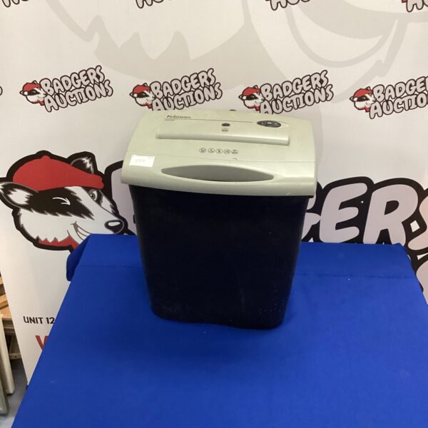 Fellows paper shredder for secure document destruction in office setting.