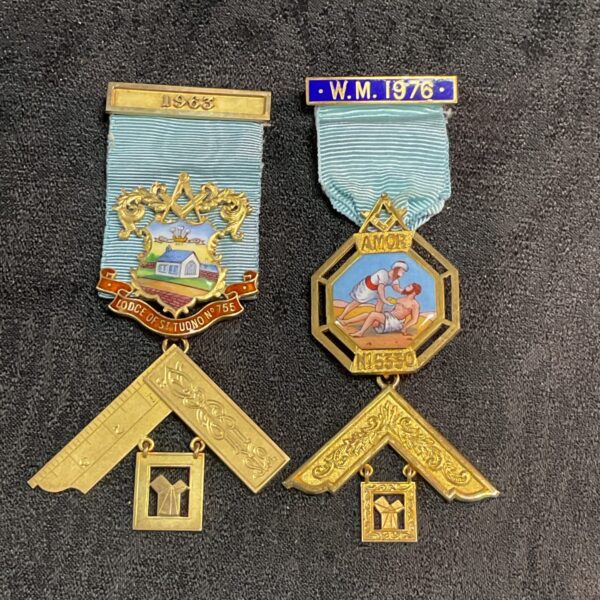 Two silver gilt Masonic jewels from 1963 and 1976, detailed emblems.