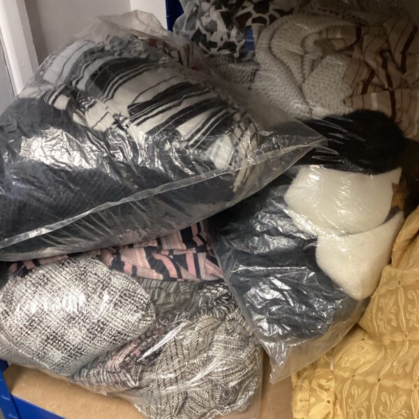 Mixed clothing lots bundle of pre-owned garments.