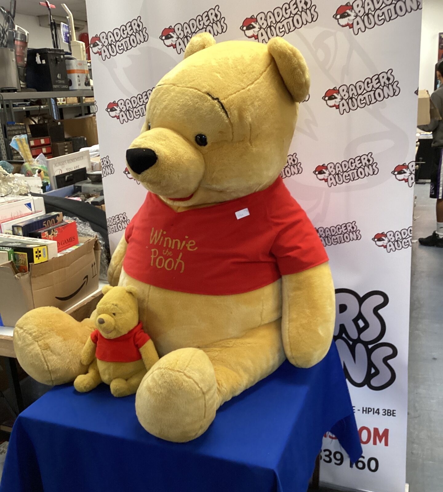 Very large Winnie the pooh teddy with small Winnie the pooh teddy bearb