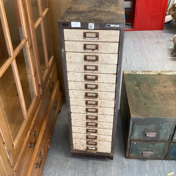 Vintage Beam metal filing cabinet with multiple drawers.