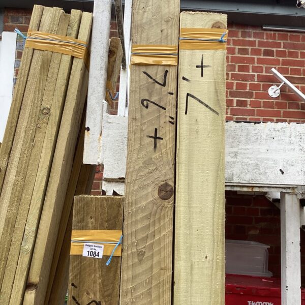 Stack of 7ft timber bundles ready for construction projects.