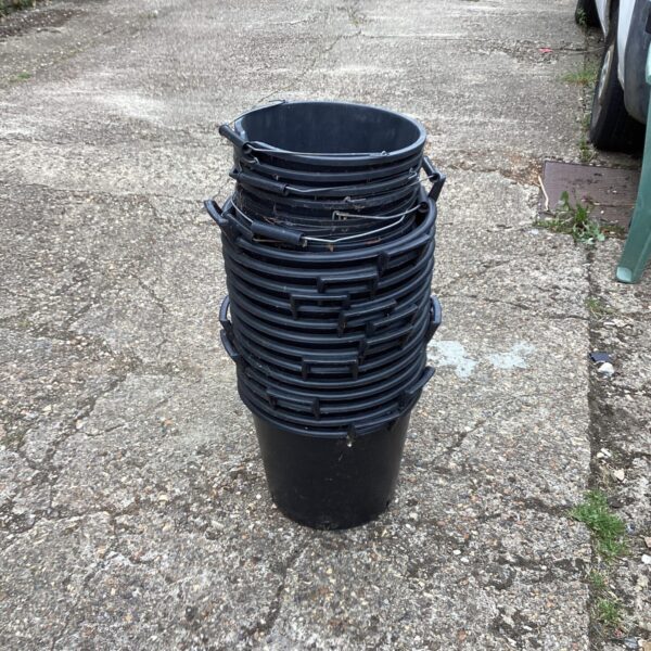 Black plastic garden tubs and buckets in a quantity lot.