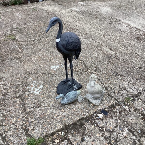 Three garden ornaments inc Heron