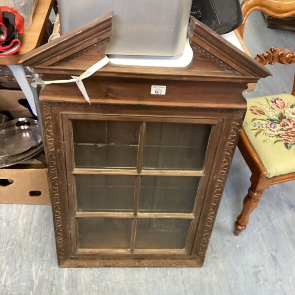 Vintage mid century glass fronted bookcase with shaped top.