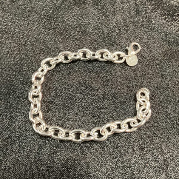 Close-up of a silver chunky link bracelet.