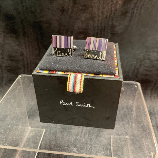 Vintage Paul Smith cufflinks with colourful patterned design.