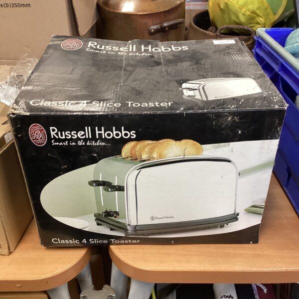 Classic Russell Hobbs 4-slice toaster in a kitchen setting.